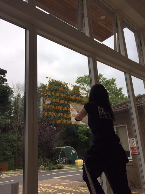 adding lettering to a window