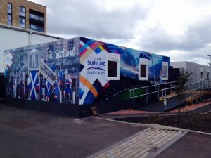 athletes village hut with scotland team written on it for the commonwealth games 2014
