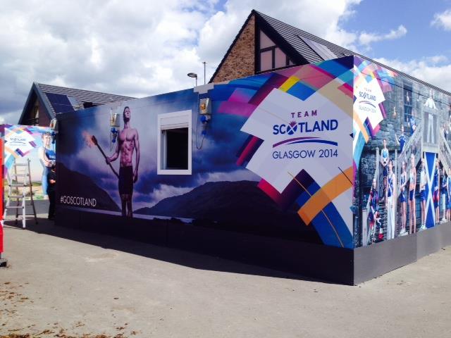 athletes village hut with scotland team written on it for the commonwealth games 2014