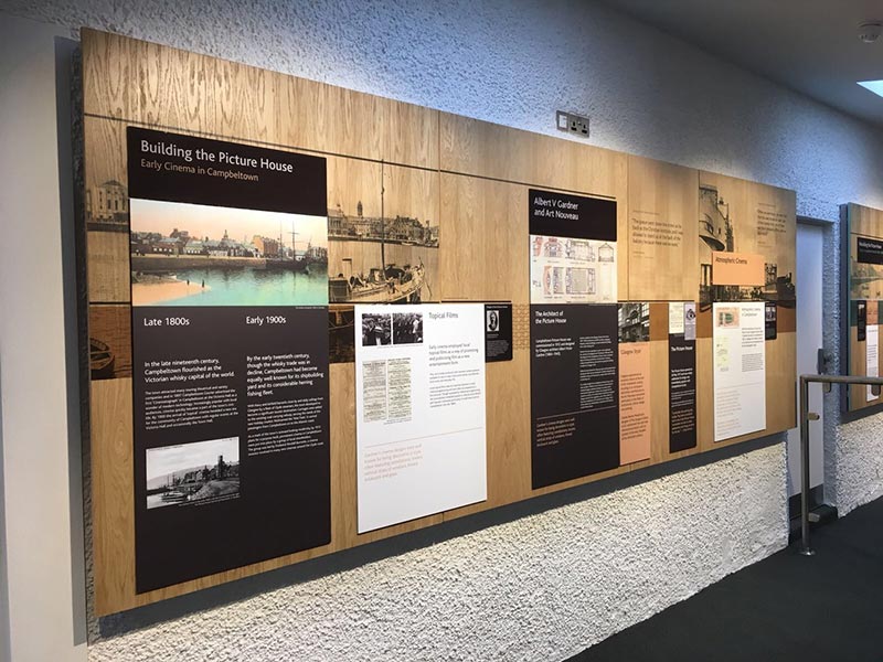 corridor with boards on the wall with info about the campbeltown picture house