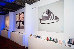adidas trainers in a row at an event
