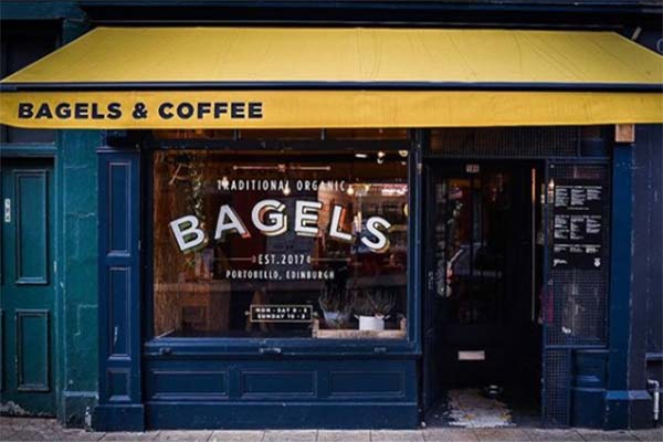 bagels and coffee shopfront window with doorway