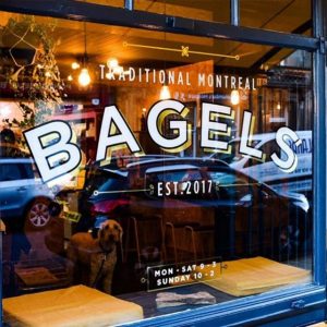 montreal bagels written on a shop window