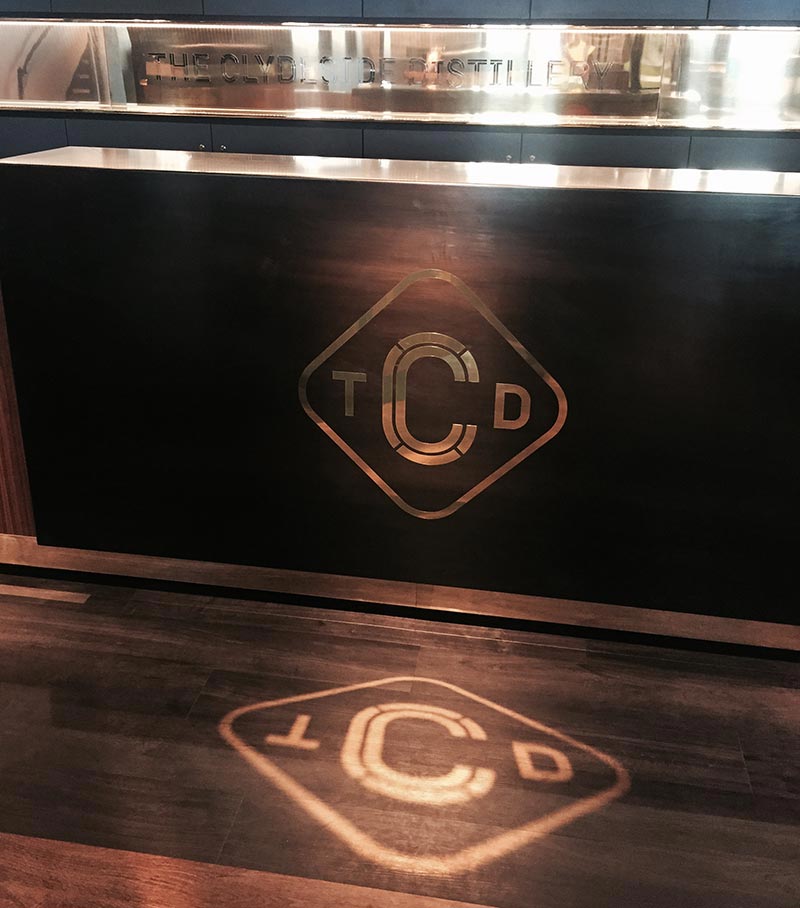 the clydeside distillery TCD  logo on a bar