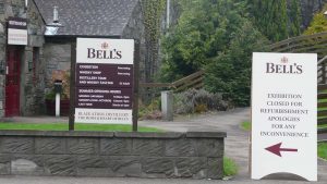 visitor signs outside for bells whisky distillery