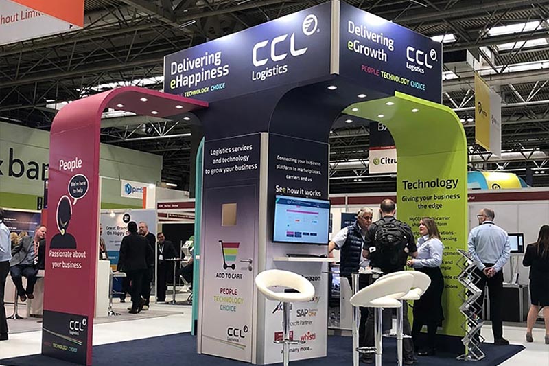 ccl logistics display stand with potential customers and seating