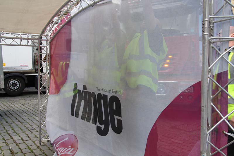 edinburgh fringe signs being installed