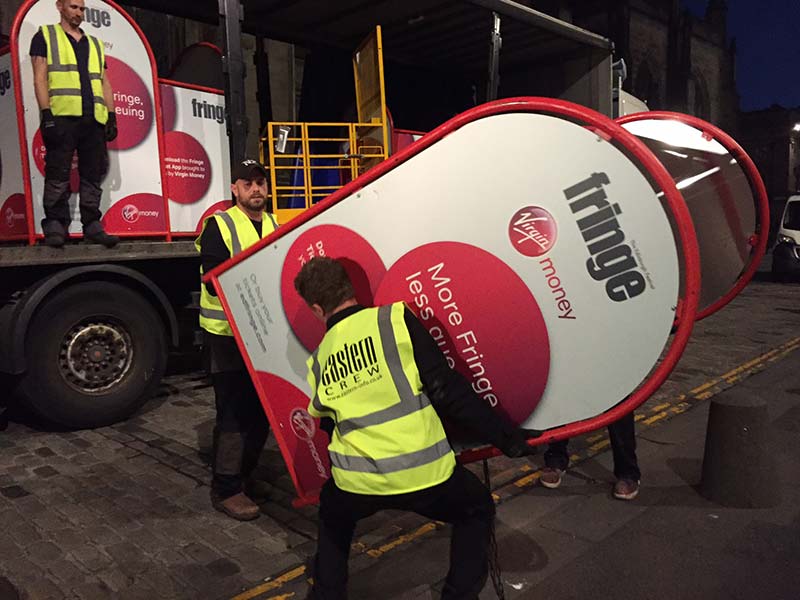 eastern workers unloading edinburgh fringe installations