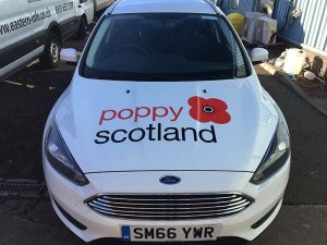 new poppy scotland signage on their car