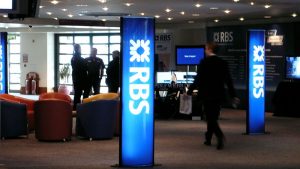 light towers with RBS branding at a conference event