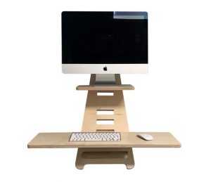 3d rendering of the standing desk with mac screen and keyboard