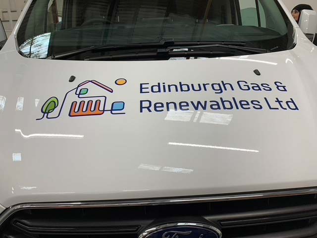 front of the van with graphic writing applied